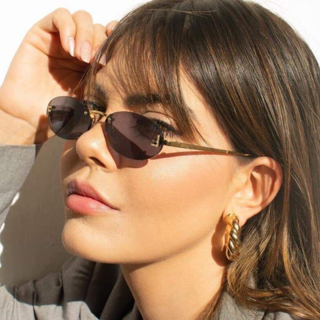Women's Sunglasses with Oval Lenses and Metal Frame
