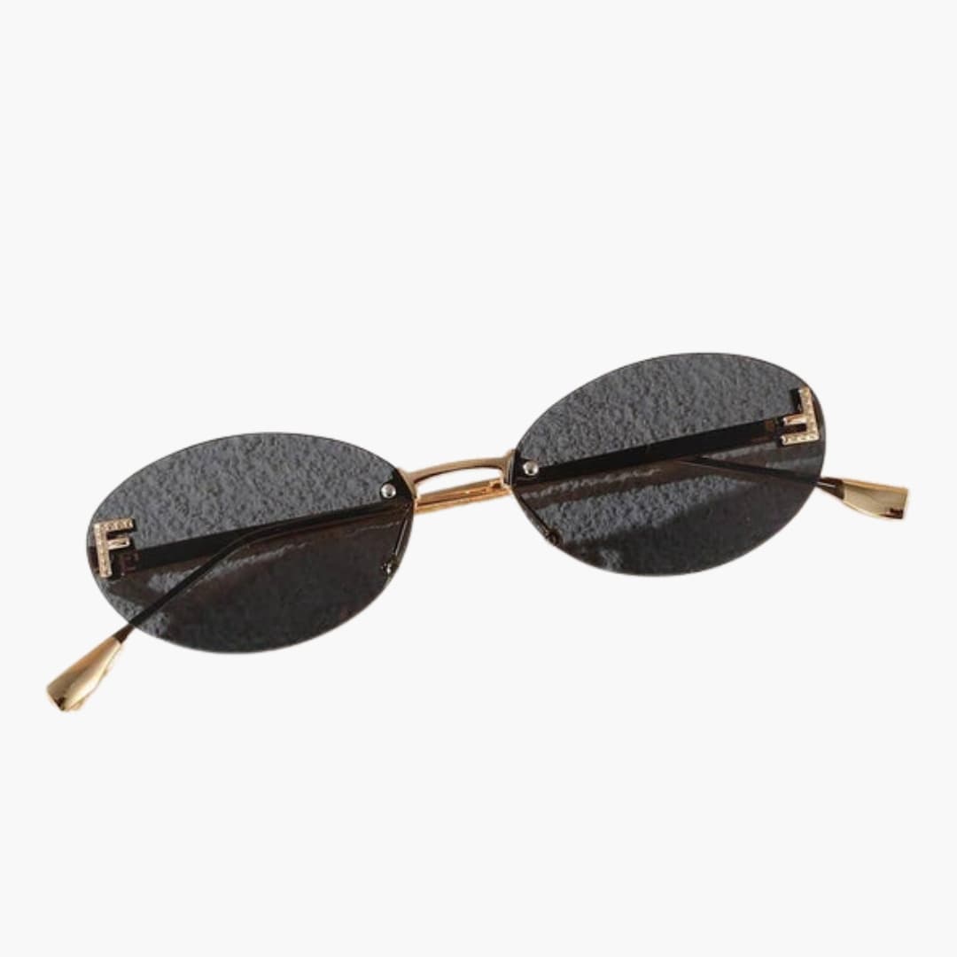 Women's Sunglasses with Oval Lenses and Metal Frame